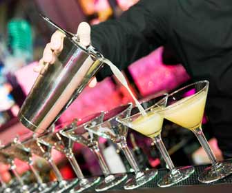 Cruise Ship Bartender Mixing Drinks for Cruise Passengers