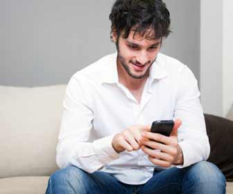 Guy Searching for a New Jobs Sitting on a Couch Photo