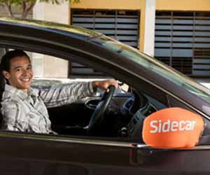 Sidecar Driver Smiles for Photo