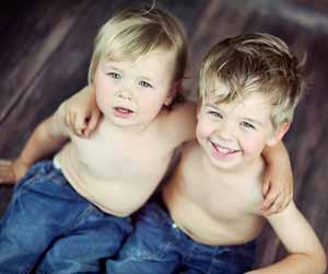 Two Little Boys Pose for Photo