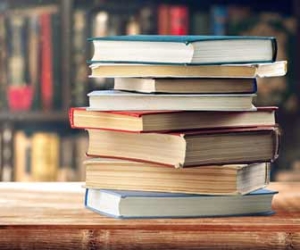 Pile Of Books In A Library Picture