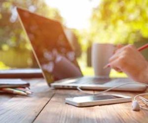 Freelancer working outside on laptop