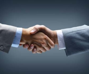 Two businessmen shaking hands