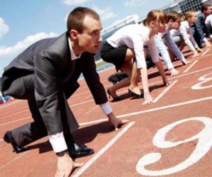 Professionals at starting line on track ready for a race