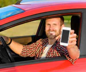 Uber Rush Driver Poses with Smartphone in Hand