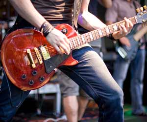 Rock Musician Playing Guitar Photo