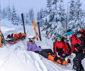 Ski Patrol Attending to Injured Skier