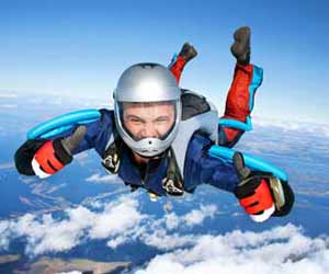 Sky Diving Instructor give a Thumbs Up on a Recent Sky Dive Photo