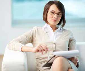 College Admissions Counselor Sitting on Couch