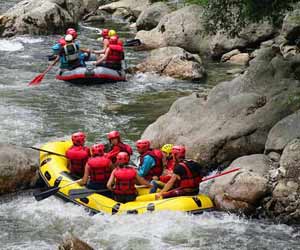 River Rafting Guide on River in Alaska