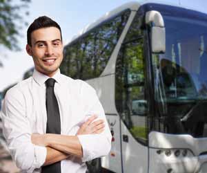 Alaska Motor Coach Driver Poses for a Photo