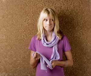 Anxious wallflower standing by herself at networking event