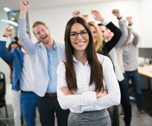 Team of happy Human Resources employees cheering