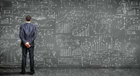 Data Scientist Staring at Blackboard