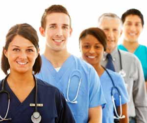 Hospital Staff and Interns Pose for Photo