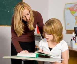 School Teacher working with Student