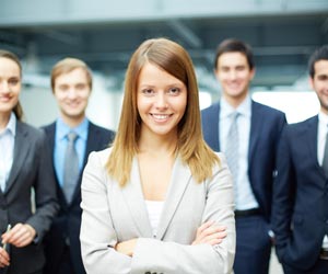 Female Sales Rep standing in front of the job search competition