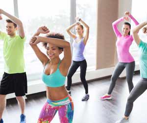 Fitness Class Instructor Teaches Class