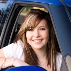 Blue Apron Delivery Worker Poses in Car