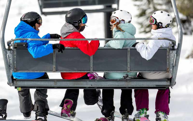 Ski Instructors Riding Chairlift