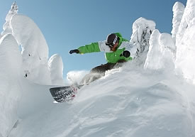 ski area worker snowboarding